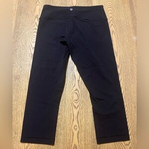 Black Lululemon mid rise, cropped leggings, size 8.